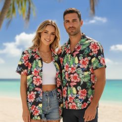 Woman in casual Hawaiian shirt with tropical motifs, relaxed standing pose in natural outdoor setting