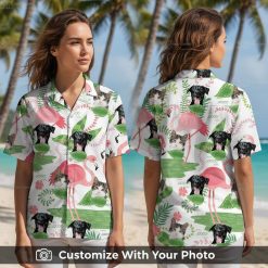 Woman wearing cat aloha shirt with tropical pets and pink flamingos design outdoors