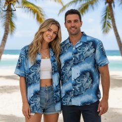 Chinese dragon pattern aloha shirt worn by model in casual indoor lifestyle photo