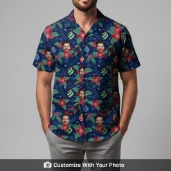 Man wearing Festive Christmas Hawaiian shirt with green leaves and ornaments for holidays