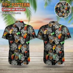Man wearing cocktail print Hawaiian shirt with drink motifs, relaxed beach lifestyle pose