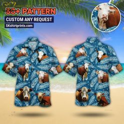 Man wearing cow print button up Aloha shirt standing on beach with palm trees in background