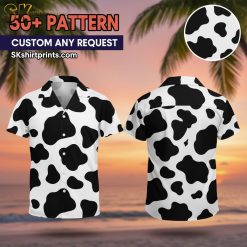 Male model wearing black and white cow pattern Hawaiian shirt in casual outdoor lifestyle setting