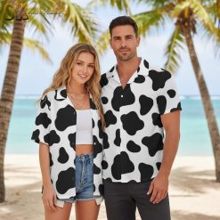 Person wearing cow themed Aloha shirt in gift-giving lifestyle scene with festive background