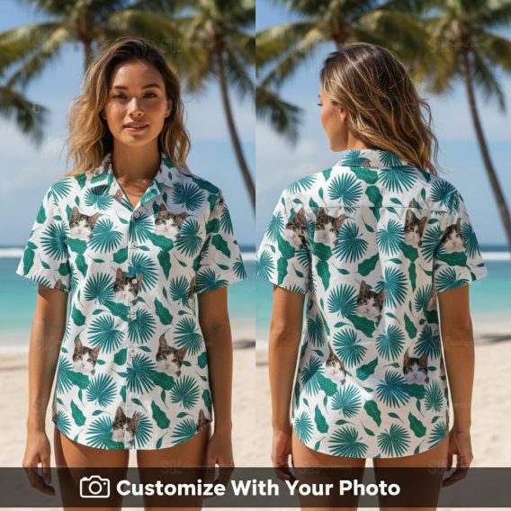 Woman wears custom cat Hawaiian shirt with teal palm leaf design on tropical vacation