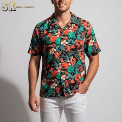 Colorful dinosaur Hawaiian shirt with tropical palm leaves and prehistoric creatures