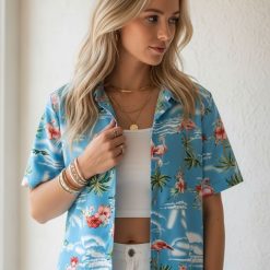 Size chart and fabric specifications infographic for pink flamingo Hawaiian shirt