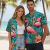 Man wearing pink flamingo Hawaiian shirt in relaxed outdoor setting showing button-down style and tropical pattern