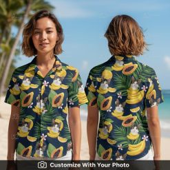 Woman wearing a Hawaiian shirt with cats, bananas, tropical leaves and pink flowers