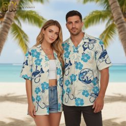 Hawaiian fish shirts displaying blue hibiscus flowers with fishing hook and fish motifs