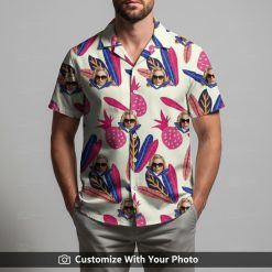 Man in cream and pink Hawaiian shirt with sunglasses face and tropical leaves design