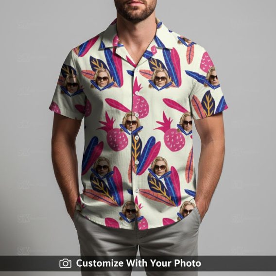 Man in cream and pink Hawaiian shirt with sunglasses face and tropical leaves design