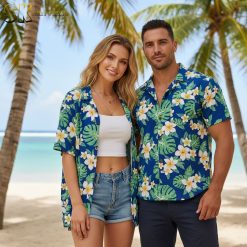 Hawaiian shirt with guns pattern featuring tropical firearm designs and island-themed weapon graphics