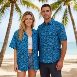 Male model showcasing Cooke Street Hawaiian shirt in vacation-style setting with tropical background