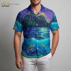 Hawaiian turtle shirt displayed on model in tropical outdoor setting with palm trees background