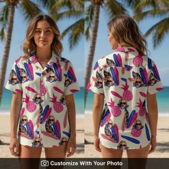 Woman wearing tropical face print Hawaiian shirt with pink fruits and blue leaves
