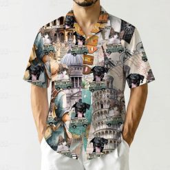Adult wearing tesla themed hawaiian shirt showing architectural landmarks vintage camper patterns