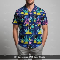 Man in fun blue Spongebob Hawaiian shirt featuring dog face and lively vacation colors