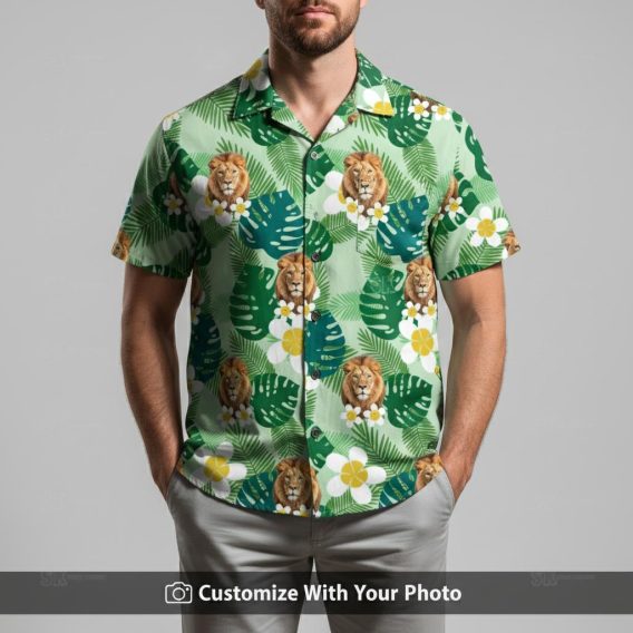 Man in green Hawaiian shirt featuring lion print, jungle leaves and exotic flowers