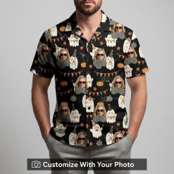 Man in a Halloween Hawaiian shirt sporting ghost and pumpkin festive designs