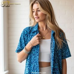 Size chart and fabric details infographic showing Cooke Street Hawaiian shirt measurements and care instructions