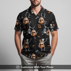 Man rocking a vintage Hawaiian Halloween shirt with skeletons and orange pumpkin art