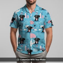 Man in blue Spongebob Hawaiian shirt with dog face, fish, and starfish design