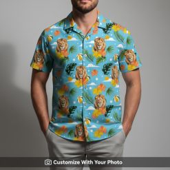Man in stylish blue Hawaiian shirt with tribal lion and tropical leaf design