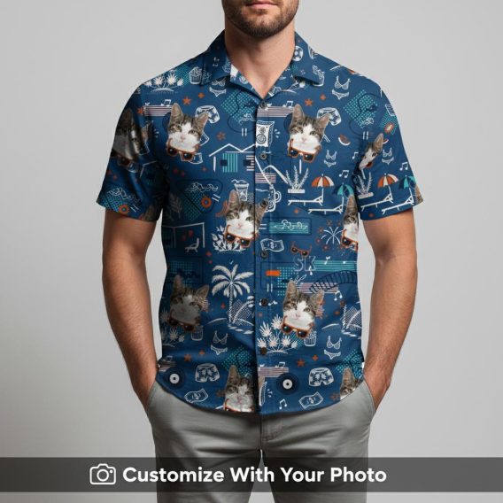 Man modeling blue Christmas Hawaiian shirt with cats, sunglasses, and palm trees