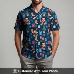 Man in Christmas tiki shirt featuring face pattern, green stockings, gifts, snowflakes