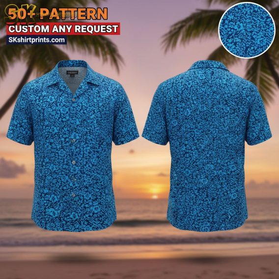 Male model wearing Cooke Street Hawaiian shirt with tropical print in casual outdoor lifestyle setting