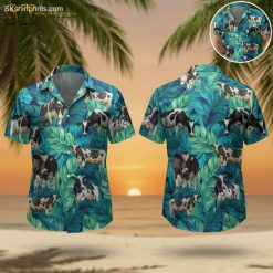 Men's cow print shirt featuring black and white cows with tropical green leaves on blue background