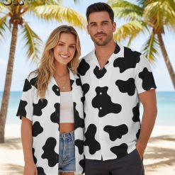 Lifestyle shot mens cow print shirt Hawaiian design worn during vacation activities