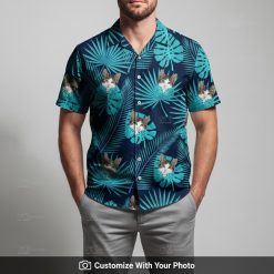 Man in custom cat Hawaiian shirt with dark blue base and tropical monstera leaves