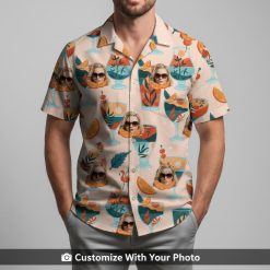 Man in custom Hawaiian shirt with sunglasses face, orange slices, and teal leaves