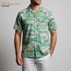 Close-up detail view of men's Donald Duck Hawaiian shirt pattern and fabric