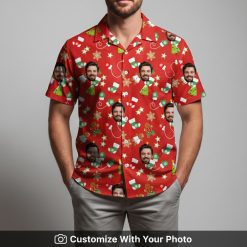 Man wearing Christmas Hawaiian shirt in red with Santa face and holiday decorations