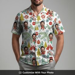 Man wearing festive Hawaiian Santa shirt with Christmas trees and floral prints