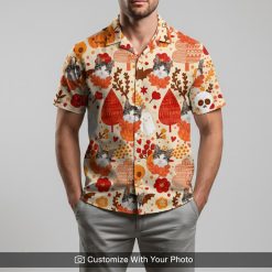 Man in Halloween Hawaiian shirt with cat, pumpkins, and red-beige autumn design