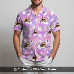 Man in Halloween Hawaiian shirt with purple and pink ghosts and bright orange stars