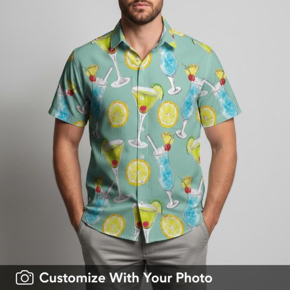 Man enjoying summer in a teal Hawaiian shirt with colorful cocktail glass patterns