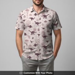 Man in tropical dinosaur aloha shirt featuring pink base and purple dinosaur patterns
