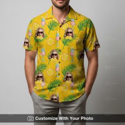 Man in yellow Hawaiian shirt featuring custom face, green leaves, and sliced lemons