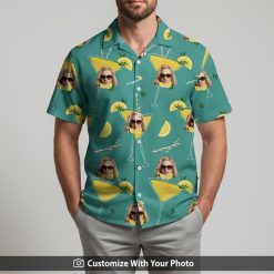 Man wearing mint green Hawaiian shirt with custom face and teal cocktail glass detail