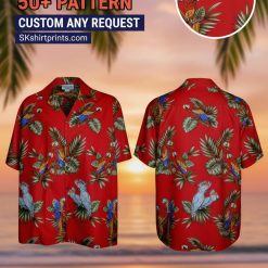 Man wearing colorful parrot Hawaiian shirt with tropical bird print standing outdoors