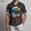 Male model posing in patriotic eagle Aloha shirt with red white blue color scheme outdoors