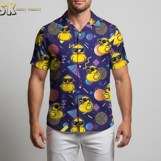 Rubber ducky Hawaiian shirt in second colorway showing yellow ducks with sunglasses and bright geometric patterns