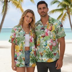 Cocktail pattern Hawaiian shirt displayed in gift presentation setting with summer accessories