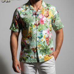 Male model wearing tropical drinks Aloha shirt in casual outdoor lifestyle setting