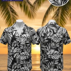 Male model wearing colorful tropical print Hawaiian shirt in casual lifestyle setting